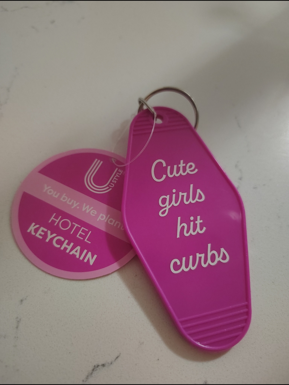 2 For $20🆕 Pink 'Cute girls hit curbs' Motel Keychain